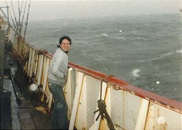 Glyn on deck in a blow