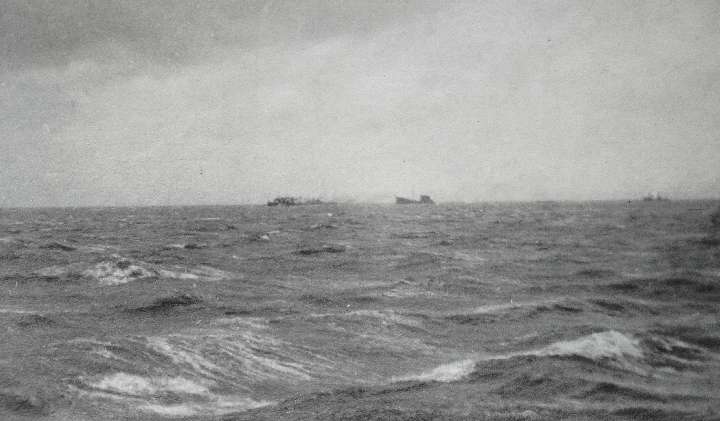 Ship under tow from the Fort