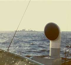 Navy ship passes astern of Mebo