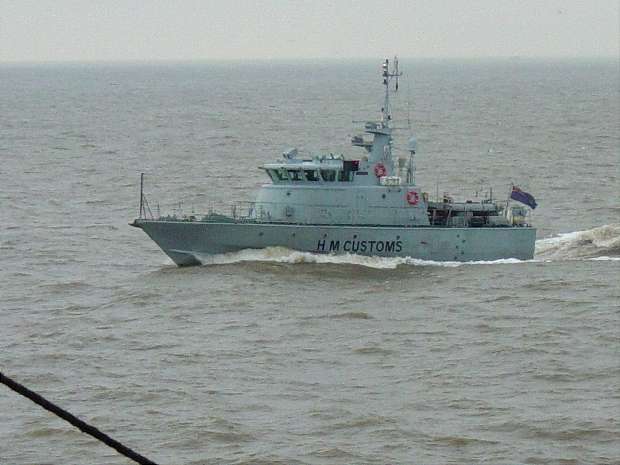 HM Customs patrol vessel passes