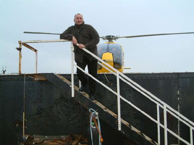 Michael Bates with helicopter