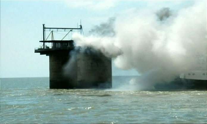 Sealand on Fire Fire Tug in mist as flames doused