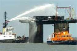 Fire Tug Dampens down