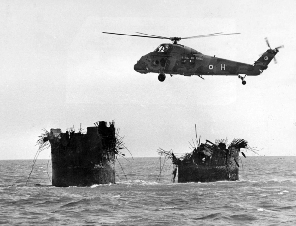 RAF Helicopter surveys the remains